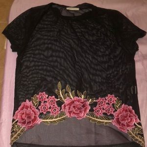 Sheer black top with rose detail stitching